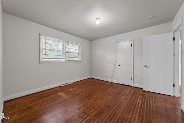 2512 Mckinney St, Burlington, NC 27217 - unfurnished bedroom featuring hardwood / wood-style floors