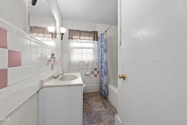 2512 Mckinney St, Burlington, NC 27217 - full bath with tile walls, vanity, and shower / bath combination with curtain