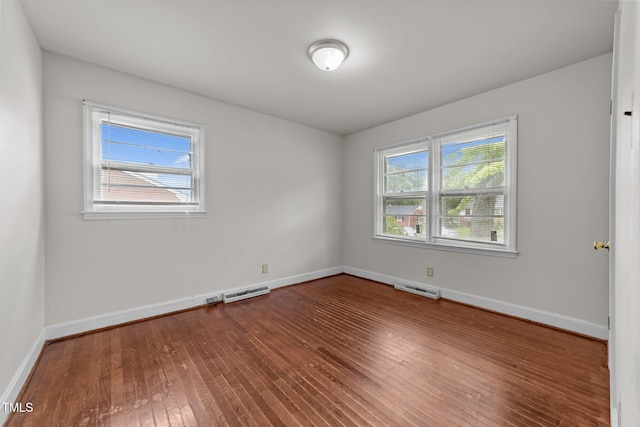 2512 Mckinney St, Burlington, NC 27217 - unfurnished room featuring wood-type flooring and baseboards