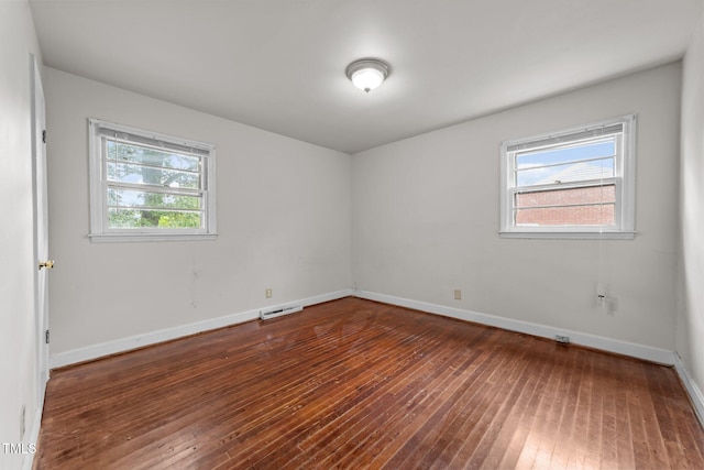 2512 Mckinney St, Burlington, NC 27217 - unfurnished room featuring wood-type flooring and baseboards