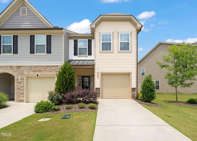 1137 Amber Shadow Dr, Durham, NC 27703 - view of front of property featuring stone siding, concrete driveway, a front lawn, and a standing seam roof