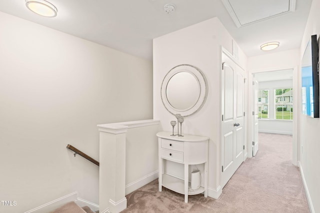 1137 Amber Shadow Dr, Durham, NC 27703 - hallway featuring an upstairs landing and light carpet