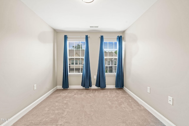 1137 Amber Shadow Dr, Durham, NC 27703 - unfurnished room featuring carpet flooring and baseboards
