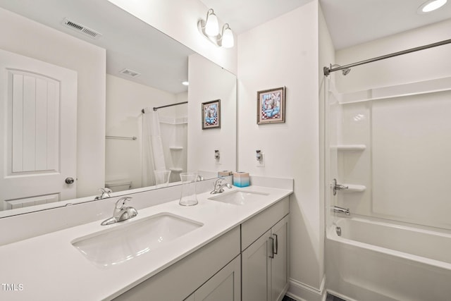 1137 Amber Shadow Dr, Durham, NC 27703 - bathroom with shower / bath combo with shower curtain and double vanity