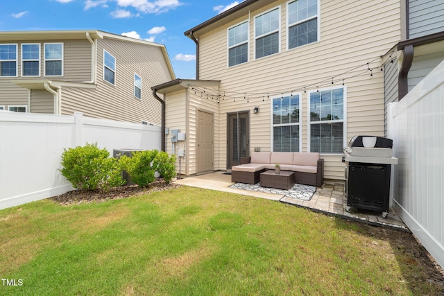 1137 Amber Shadow Dr, Durham, NC 27703 - back of property with an outdoor hangout area and a patio