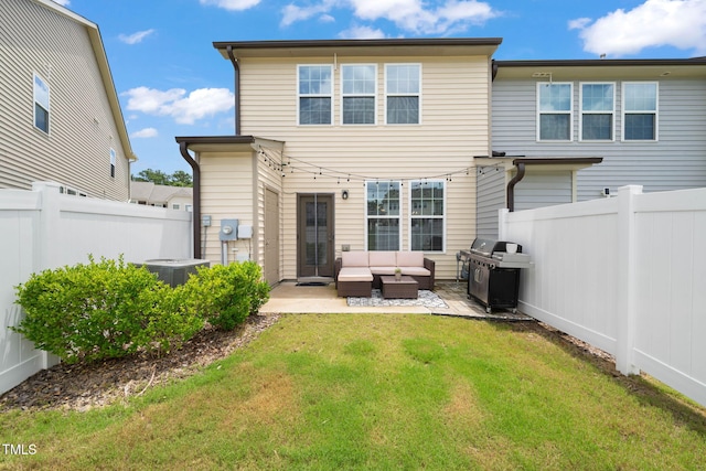 1137 Amber Shadow Dr, Durham, NC 27703 - back of property with an outdoor living space, a patio area, and a fenced backyard