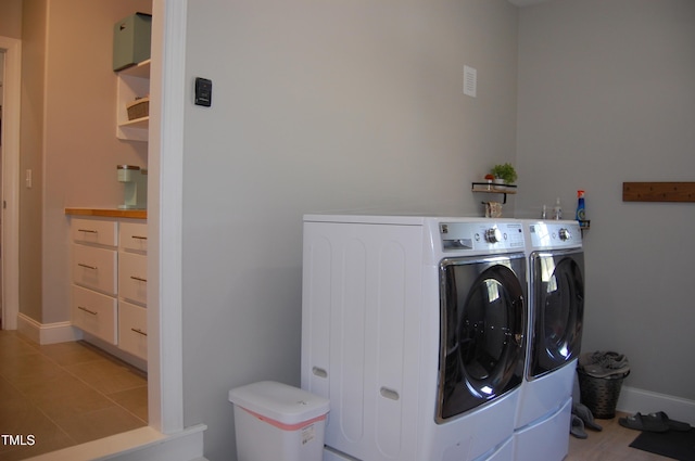 2471 Golden Forest Dr, Franklinton, NC 27525 - washroom with independent washer and dryer and light tile patterned floors