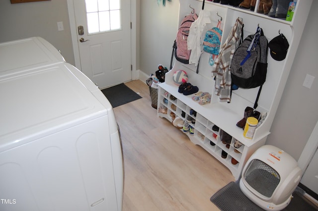 2471 Golden Forest Dr, Franklinton, NC 27525 - washroom with washing machine and clothes dryer and wood finished floors