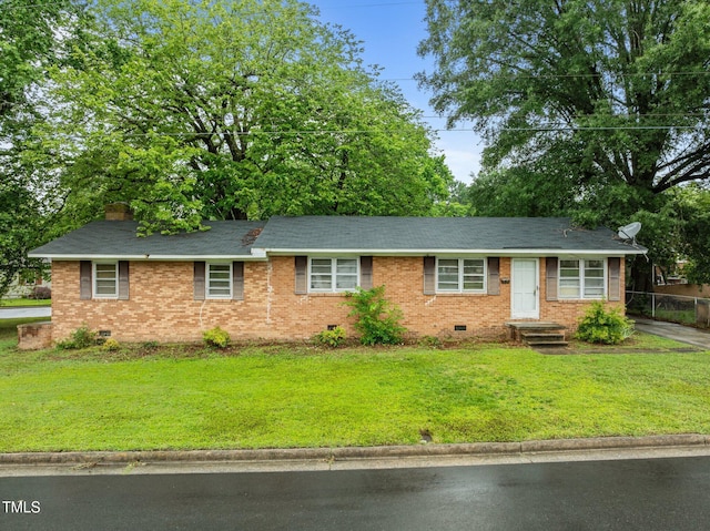 1402 Tarleton Ave, Burlington, NC 27215 - ranch-style house with crawl space, a front yard, brick siding, and a chimney