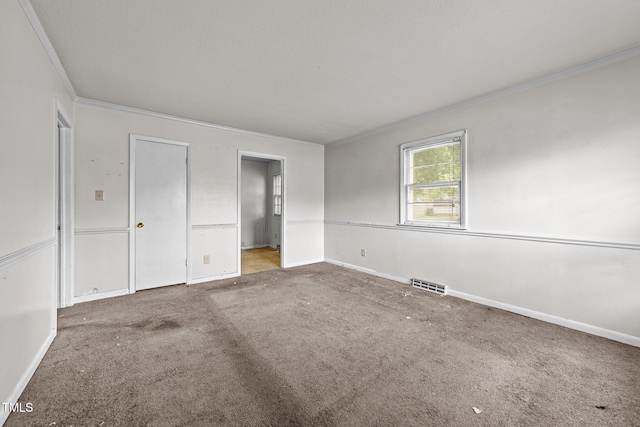 1402 Tarleton Ave, Burlington, NC 27215 - unfurnished bedroom featuring ornamental molding and carpet