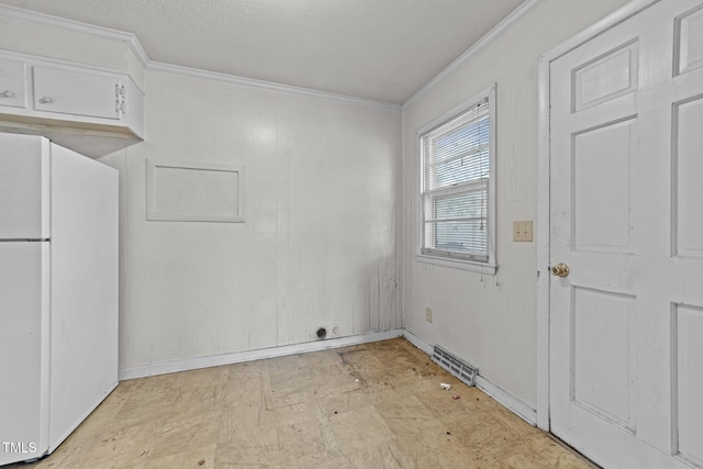 1402 Tarleton Ave, Burlington, NC 27215 - unfurnished dining area with ornamental molding and a textured ceiling