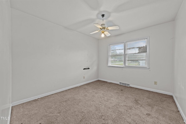 1402 Tarleton Ave, Burlington, NC 27215 - carpeted empty room featuring a ceiling fan and baseboards