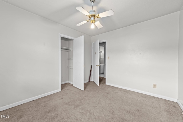 1402 Tarleton Ave, Burlington, NC 27215 - unfurnished bedroom with carpet flooring, a closet, and a ceiling fan