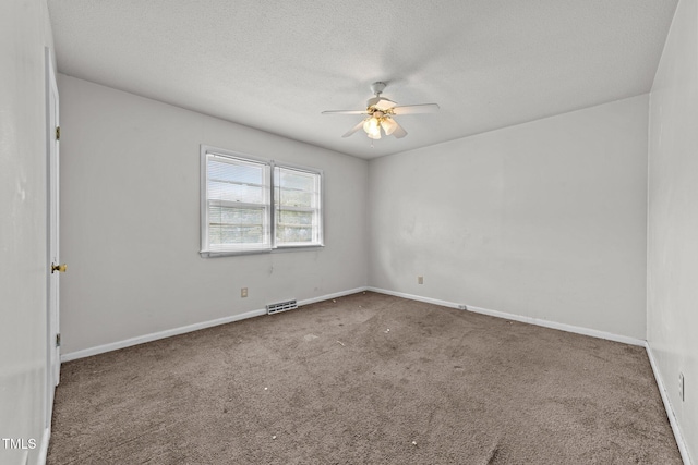 1402 Tarleton Ave, Burlington, NC 27215 - carpeted empty room featuring a ceiling fan and a textured ceiling
