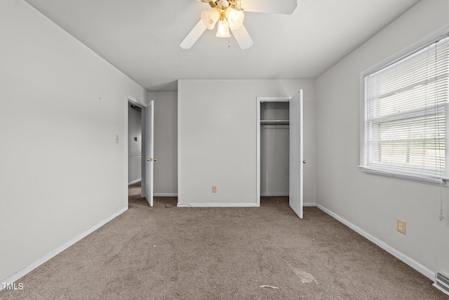 1402 Tarleton Ave, Burlington, NC 27215 - unfurnished bedroom featuring carpet, a closet, and ceiling fan