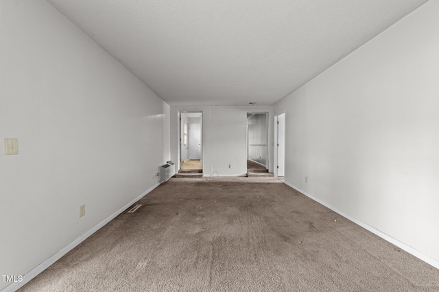 1402 Tarleton Ave, Burlington, NC 27215 - unfurnished room featuring carpet flooring and baseboards