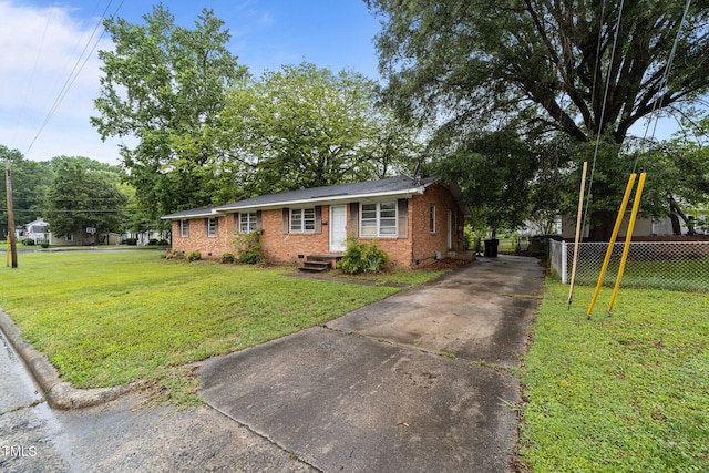 1402 Tarleton Ave, Burlington, NC 27215 - ranch-style home featuring driveway, brick siding, and crawl space