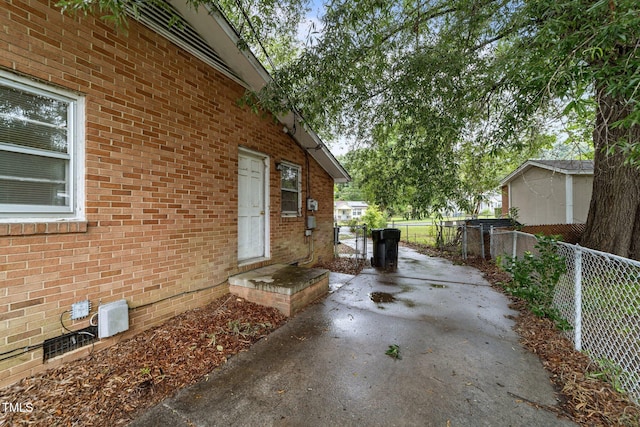 1402 Tarleton Ave, Burlington, NC 27215 - view of property exterior featuring brick siding