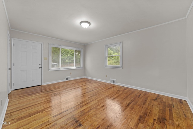 807 New St, Graham, NC 27253 - spare room with ornamental molding and wood finished floors