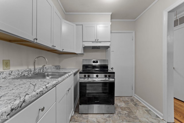 807 New St, Graham, NC 27253 - kitchen with electric range, under cabinet range hood, white cabinetry, crown molding, and stone finish flooring