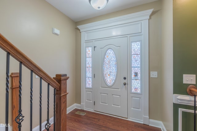 168 Melody Ln, Cameron, NC 28326 - foyer entrance with dark wood-style floors, plenty of natural light, and stairway