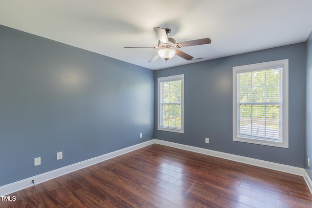 168 Melody Ln, Cameron, NC 28326 - unfurnished room featuring plenty of natural light, a ceiling fan, and dark wood finished floors
