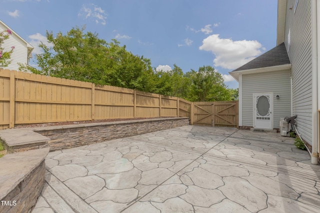 168 Melody Ln, Cameron, NC 28326 - fenced backyard featuring a patio and a gate