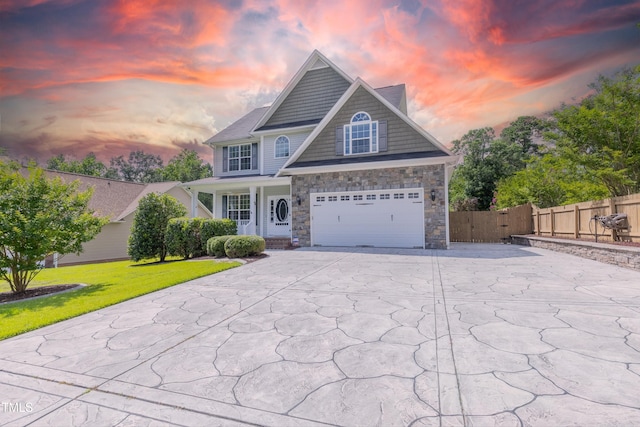 168 Melody Ln, Cameron, NC 28326 - view of front facade with concrete driveway, a porch, and a garage