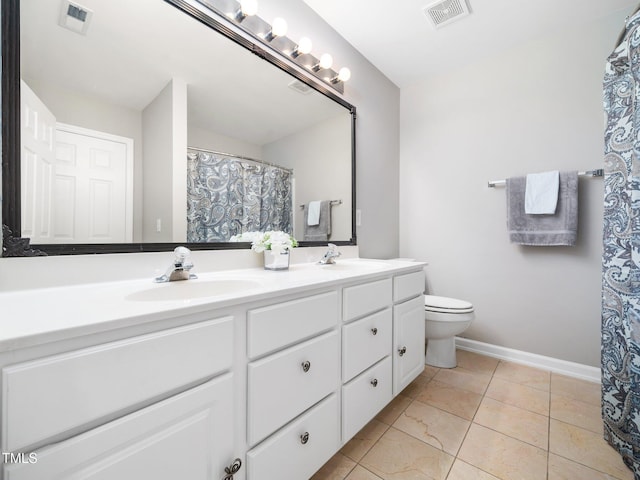 5505 Crabtree Park Ct, Raleigh, NC 27612 - full bath with double vanity and tile patterned floors