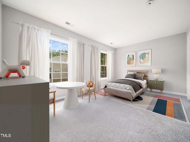 5505 Crabtree Park Ct, Raleigh, NC 27612 - carpeted bedroom with baseboards