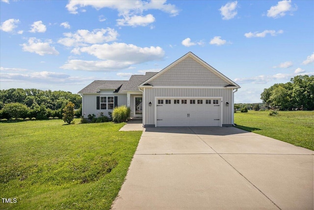 174 Arrow Ln, Middlesex, NC 27557 - view of front of home featuring board and batten siding, an attached garage, driveway, and a front lawn