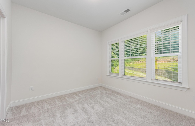 1417 Westmoreland Dr, Raleigh, NC 27612 - carpeted spare room featuring baseboards