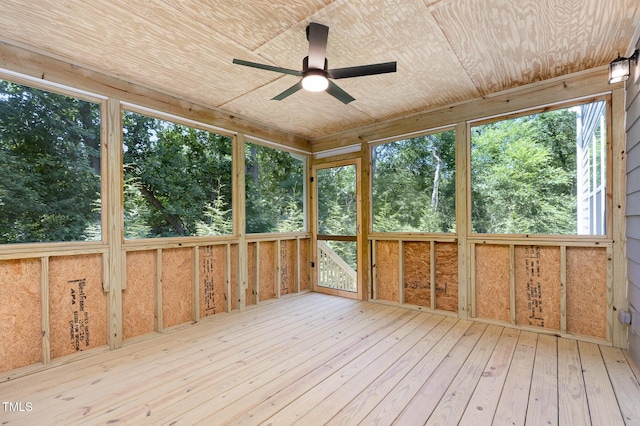 1417 Westmoreland Dr, Raleigh, NC 27612 - unfurnished sunroom featuring a ceiling fan and view of wooded area