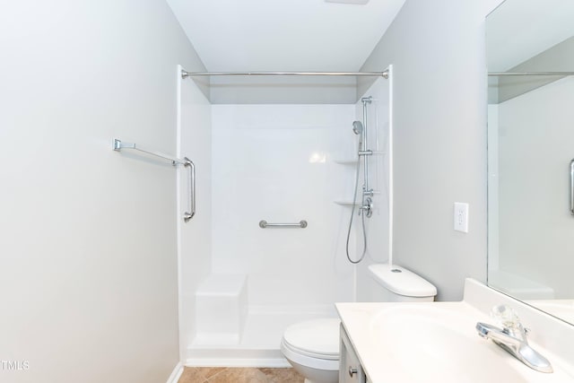 4125 Scofield Dr, Raleigh, NC 27610 - bathroom with vanity, a shower, and tile patterned flooring