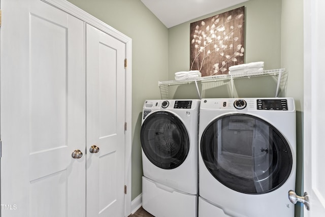 509 Kildaire Farm Rd Unit 305, Cary, NC 27511 - laundry area with separate washer and dryer and baseboards