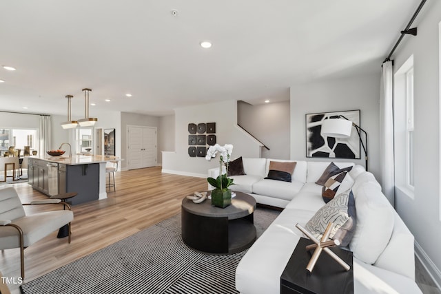 509 Kildaire Farm Rd Unit 305, Cary, NC 27511 - living room with light wood-style flooring and recessed lighting