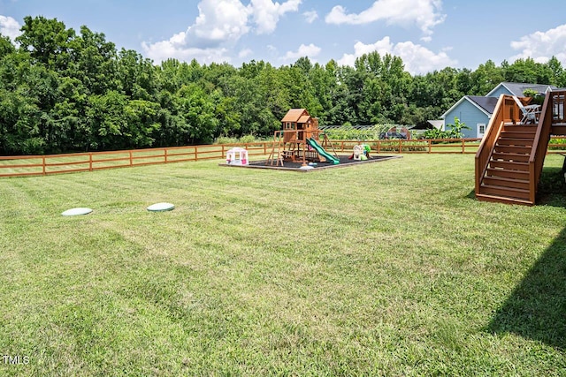 3128 Bramblegate Dr, Mebane, NC 27302 - fenced backyard with a playground and stairway