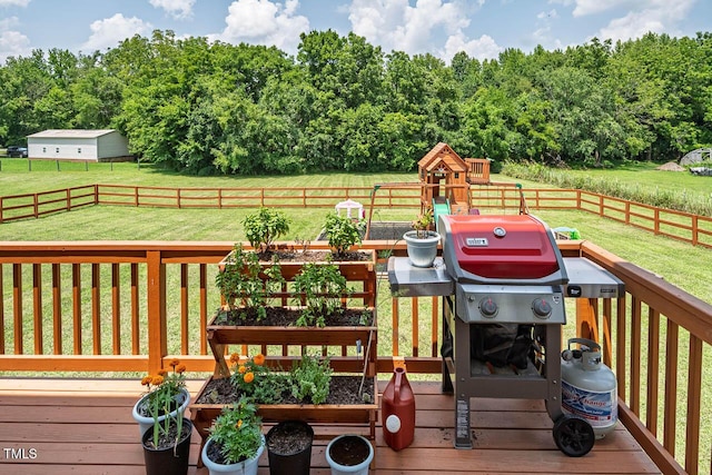3128 Bramblegate Dr, Mebane, NC 27302 - wooden deck with a fenced backyard, a garden, a view of rural / pastoral area, and a playground