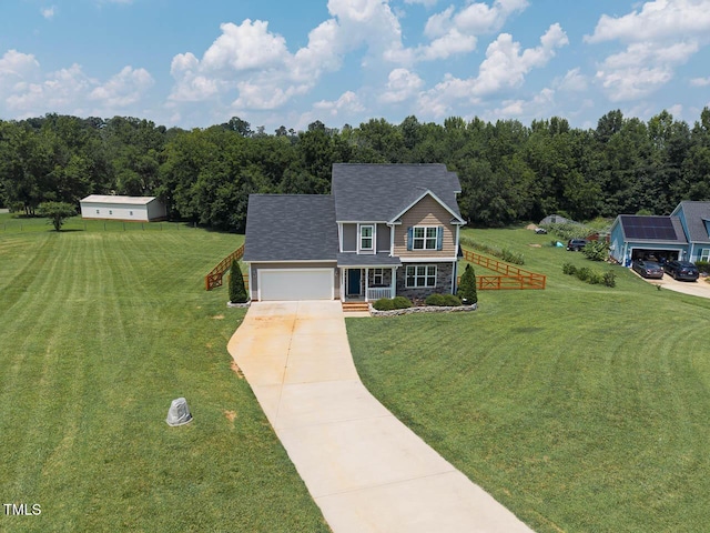 3128 Bramblegate Dr, Mebane, NC 27302 - view of front of house with concrete driveway, a front lawn, a garage, and roof with shingles