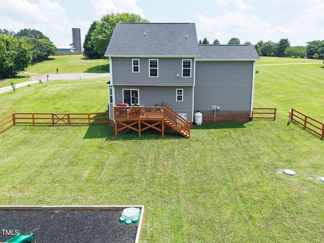 3128 Bramblegate Dr, Mebane, NC 27302 - rear view of house with a wooden deck and a fenced backyard