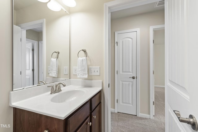 1320 Cozy Oak Ave, Cary, NC 27519 - bathroom featuring vanity and baseboards