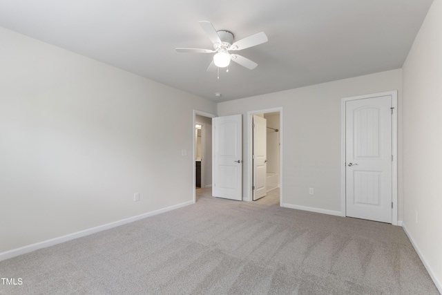 1320 Cozy Oak Ave, Cary, NC 27519 - unfurnished bedroom featuring carpet flooring, ensuite bathroom, and a ceiling fan