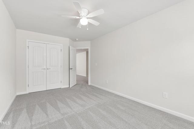 1320 Cozy Oak Ave, Cary, NC 27519 - unfurnished bedroom with carpet floors, a closet, and a ceiling fan