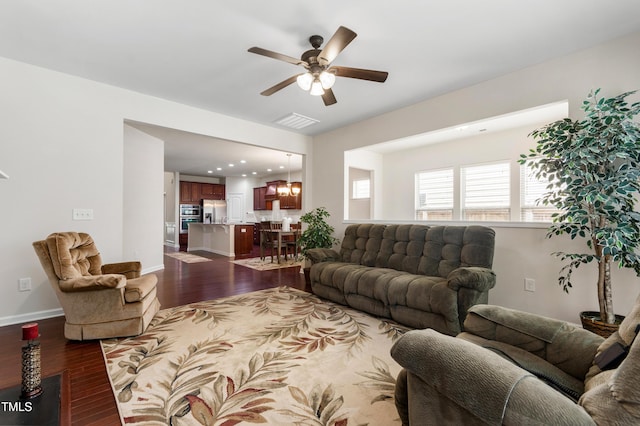 1320 Cozy Oak Ave, Cary, NC 27519 - living area featuring dark wood-type flooring and a ceiling fan