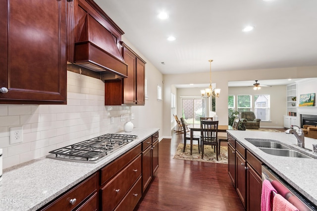 1320 Cozy Oak Ave, Cary, NC 27519 - kitchen featuring stainless steel appliances, dark wood-style floors, custom range hood, open floor plan, and a ceiling fan