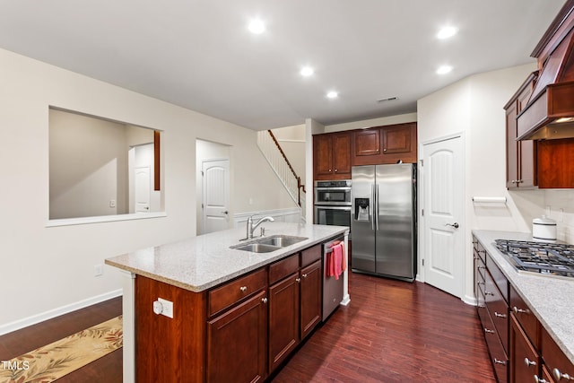 1320 Cozy Oak Ave, Cary, NC 27519 - kitchen featuring stainless steel appliances, dark wood-style flooring, a center island with sink, premium range hood, and light stone countertops