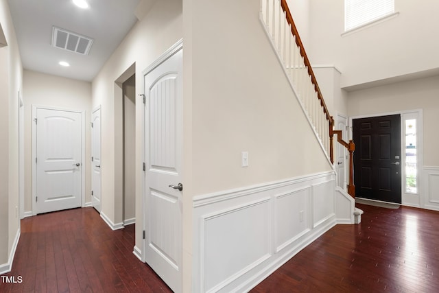 1320 Cozy Oak Ave, Cary, NC 27519 - foyer featuring hardwood / wood-style floors, stairway, a wainscoted wall, recessed lighting, and a decorative wall