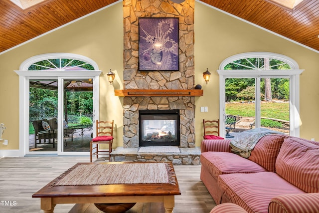 9009 Hometown Dr, Raleigh, NC 27615 - living room with wooden ceiling, healthy amount of natural light, high vaulted ceiling, wood finished floors, and ornamental molding