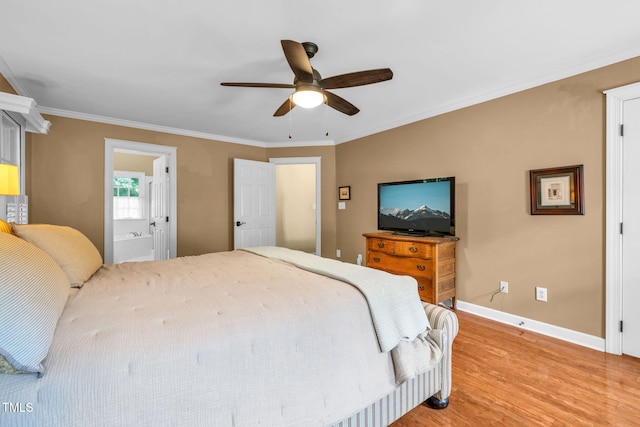 9009 Hometown Dr, Raleigh, NC 27615 - bedroom with light wood-type flooring, crown molding, a ceiling fan, and ensuite bath