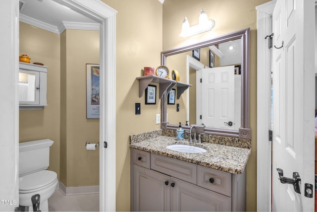 9009 Hometown Dr, Raleigh, NC 27615 - half bath with crown molding, vanity, and tile patterned floors